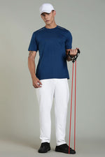 Navy blue Outlaws Fashion men's athleisure T-shirt with athletic fit and casual style, displayed on a plain background.