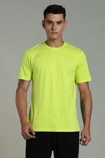 Outlaws Lime Green Athleisure T-shirt for men, featuring a comfortable fit and casual design, displayed on a neutral background.