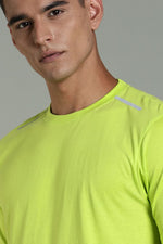 Outlaws Lime Green Athleisure T-shirt for Men, featuring a fitted design and breathable fabric, displayed on a mannequin.
