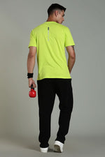 Outlaws Lime Green Athleisure T-shirt for men, featuring a comfortable fit and stylish design, shown on a model.