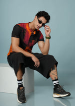 Men’s abstract rayon shirt in black and orange with bold casual style, featuring a modern design from Outlaws Fashion.