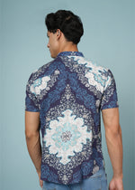 Men’s blue printed rayon shirt by Outlaws Fashion, featuring soft fabric and stylish casual design, shown on a hanger.
