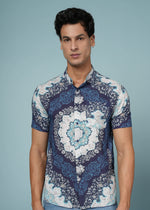 Men's blue printed rayon shirt from Outlaws Fashion, featuring soft fabric and stylish casual design, displayed on a hanger.