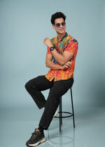 Men’s abstract print rayon shirt by Outlaws Fashion, vibrant summer casual wear with colorful, artistic design and lightweight fabric.
