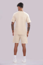 Men’s cream co-ord set from Outlaws Fashion featuring comfortable matching sweatshirt and jogger pants for everyday wear.