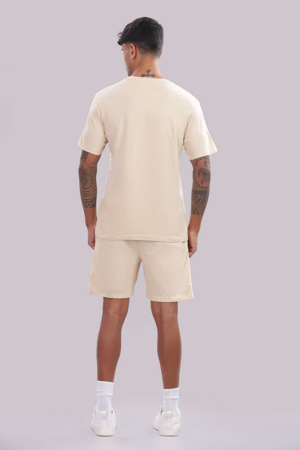 Men’s cream co-ord set from Outlaws Fashion featuring comfortable matching sweatshirt and jogger pants for everyday wear.