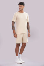Men’s cream co-ord set from Outlaws Fashion featuring a comfortable matching top and pants for everyday casual wear.