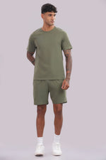 Men’s olive green co-ord set from Outlaws Fashion, casual comfort wear with matching top and pants, relaxed fit and stylish design.