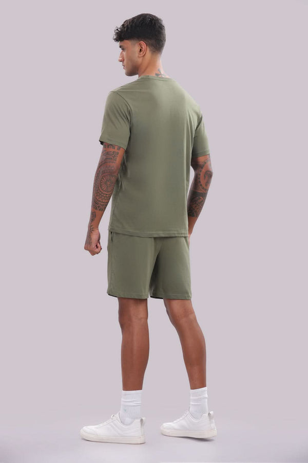 Men’s olive green co-ord set from Outlaws Fashion, featuring a comfortable matching sweatshirt and joggers for everyday wear.