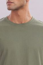 Men’s olive green co-ord set from Outlaws Fashion, comfortable casual wear, featuring matching top and pants in relaxed fit.