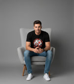 Men’s Outlaws Christmas printed T-shirt featuring festive holiday design, 100% cotton casual wear for men.