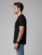 Men’s Outlaws Christmas printed T-shirt featuring festive holiday design, 100% cotton casual wear for men.