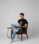 Men’s Outlaws Christmas printed T-shirt featuring festive holiday design, made from 100% cotton for casual winter wear.