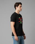 Men’s Outlaws Christmas printed T-shirt featuring festive holiday design, 100% cotton casual wear, with colorful holiday-themed graphics.