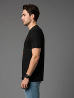 Men’s Outlaws Christmas printed T-shirt made of 100% cotton, featuring festive holiday design for casual wear.