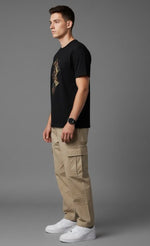 Men's Outlaws Fashion printed T-shirt, 100% cotton casual wear with bold graphic design and regular fit, shown on a model.