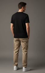 Men’s Outlaws Regular Printed T-Shirt made of 100% cotton, casual wear with bold graphic design, shown on a model.