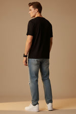 Men’s Outlaws Fashion printed cotton T-shirt with casual fit, shown with a bold graphic design on the front.