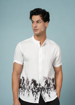 Men’s white printed shirt with running horse design and modern mandarin collar, from Outlaws Fashion, displayed on a hanger.