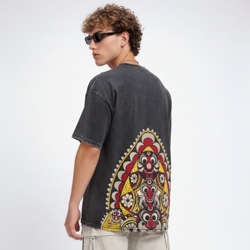 Black acid wash men's T-shirt featuring a vintage-inspired design, styled casually for a rugged, edgy look.