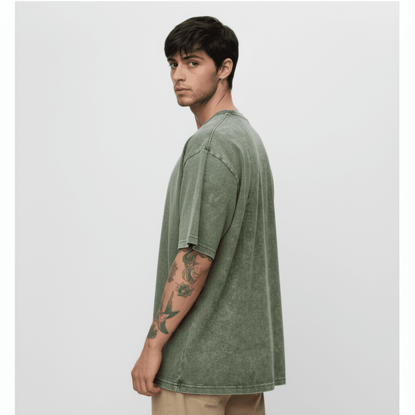 Outlaws Acid Wash Olive T-Shirt for Men featuring a casual fit and distressed design, displayed in a virtual photoshoot setting.