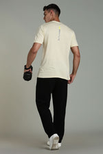 Outlaws Fashion beige men's athleisure T-shirt displayed on a hanger, casual stylish athletic wear for men