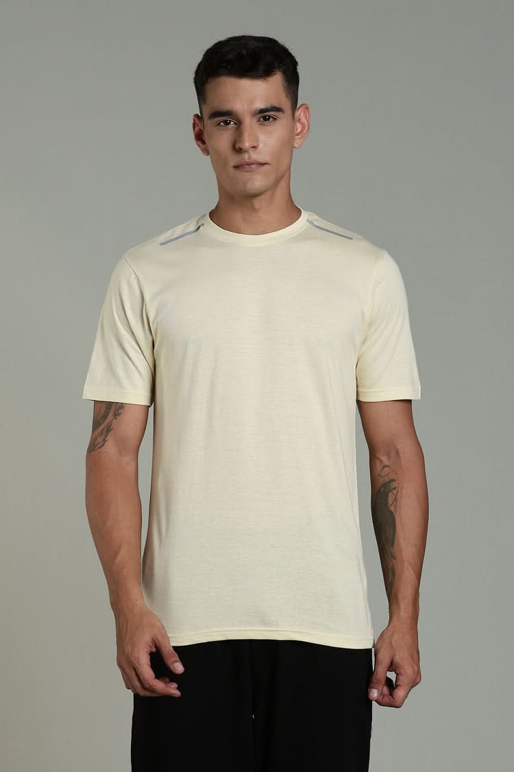 Outlaws Fashion beige men's athleisure T-shirt with crew neckline, casual athletic style, laid flat for display.
