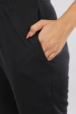 black track pants for women side profile