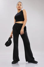 Outlaws Fashion black women's track pants with elastic waistband, and sporty style for casual wear.
