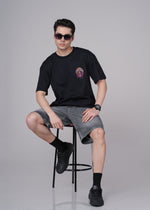 Men's Outlaws Graphic T-Shirt from Outlaws Fashion featuring bold outlaw-themed design on black cotton fabric.