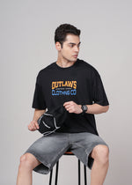 Men's Outlaws Graphic T-Shirt by Outlaws Fashion featuring bold outlaw-themed design on casual black cotton tee.