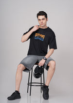 Men's Outlaws Graphic T-Shirt from Outlaws Fashion featuring bold black and white outlaw-themed print on soft cotton fabric.