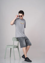 Outlaws Grey Oversized Graphic T-Shirt for Men, showing bold print design on soft cotton fabric.