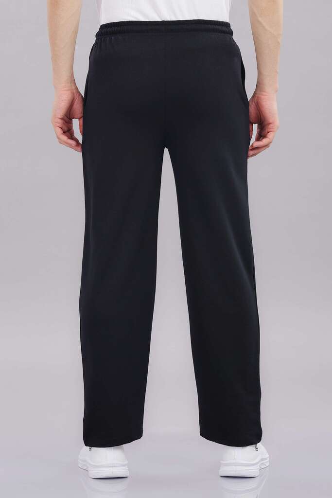 outlaws black track pants fabric texture close up