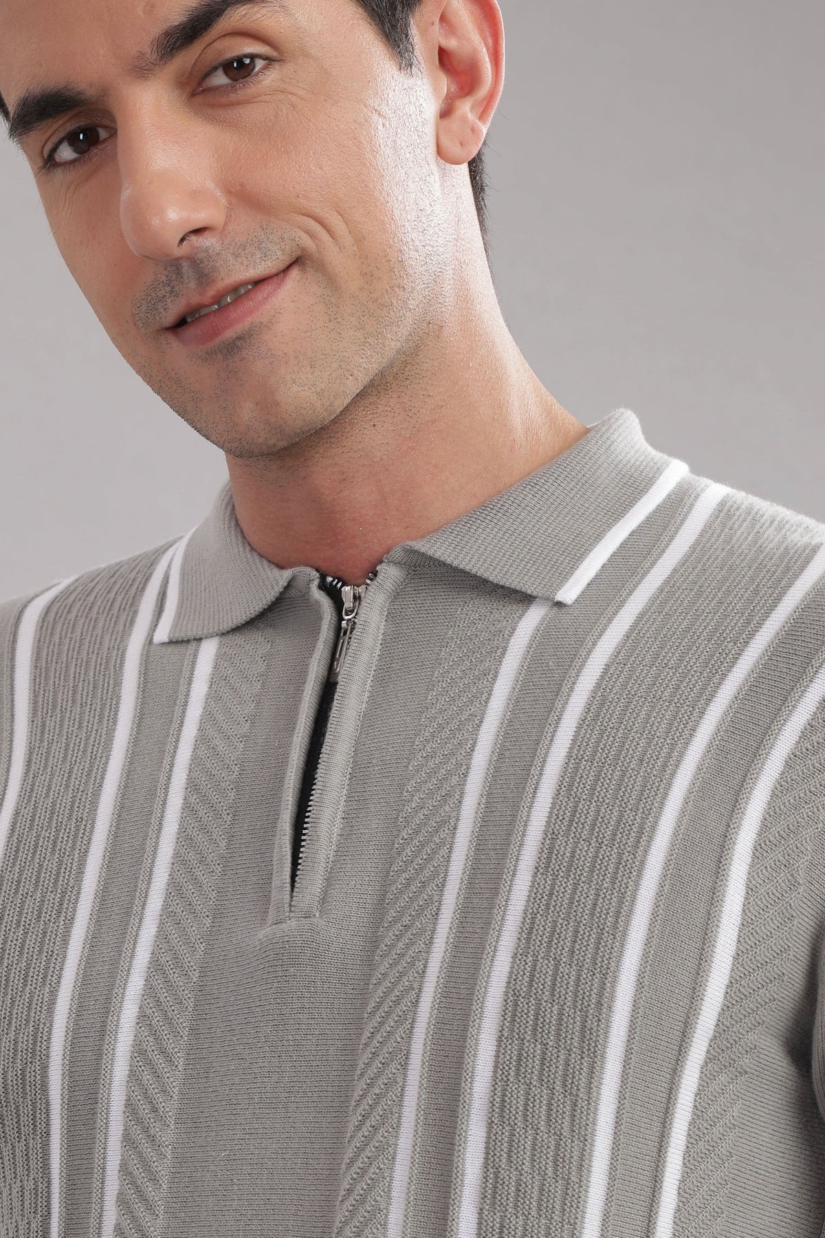 Outlaws Fashion premium grey striped cotton flat-knit T-shirt displayed flat with a crew neck and stylish striped pattern.