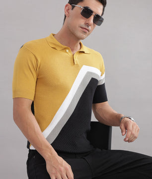 Stylish men's cotton colour-block knitted polo T-shirt in mustard, black, and grey from Outlaws Fashion, displayed on a mannequin.