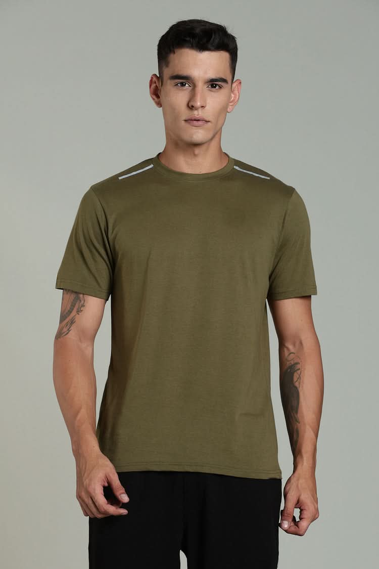 Outlaws Fashion men's olive green athleisure T-shirt with a comfortable fit and casual style, shown on a model.