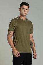 Outlaws Fashion olive green men's athleisure T-shirt with a relaxed fit, casual style, and comfortable fabric.