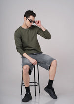 Outlaws Olive men's sweatshirt with a casual fit, featuring a soft fabric and stylish design for comfortable everyday wear.