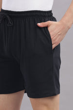 Outlaws Fashion men's shorts displayed on a hanger, featuring a casual design with multiple pockets and a relaxed fit.