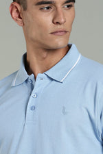 Men's sky blue polo shirt by Outlaws Fashion, featuring a classic fit and short sleeves, displayed on a plain background.