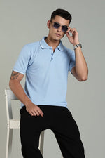 Sky blue men's polo T-shirt from Outlaws Fashion, featuring a classic collar and short sleeves, displayed on a mannequin.