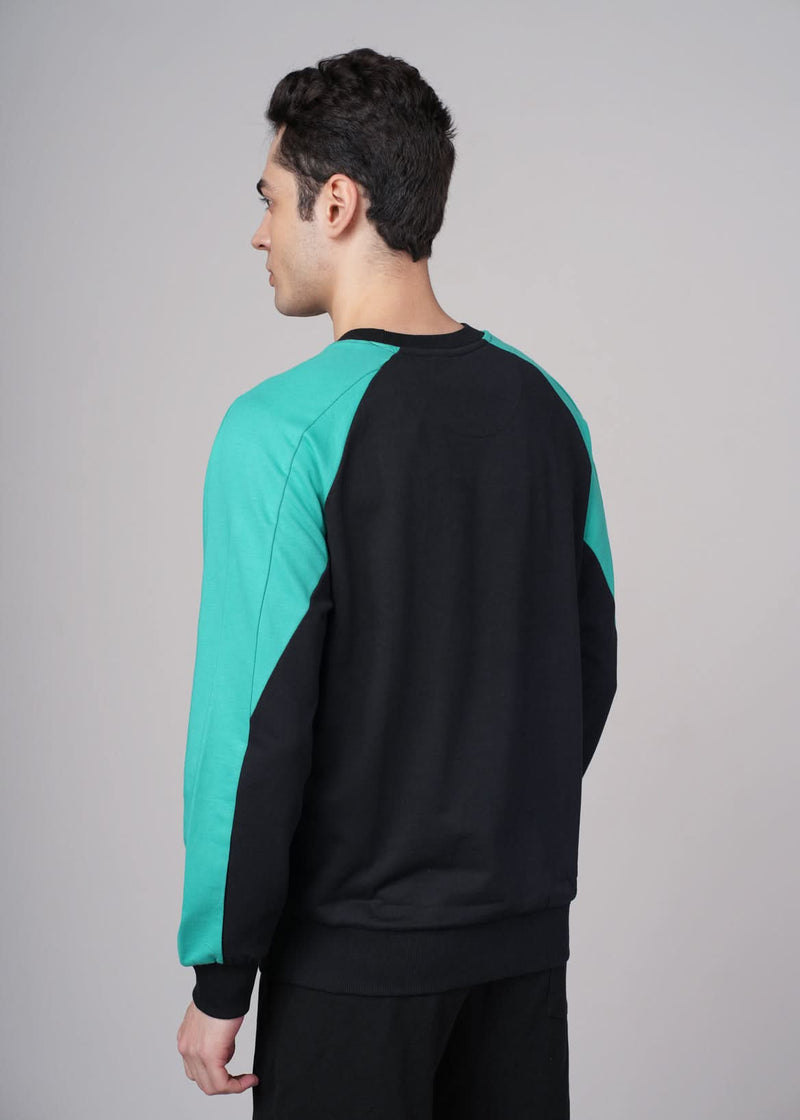Men's Outlaws Sweatshirt by Outlaws Fashion, casual gray sweatshirt with logo detail, shown on a model.