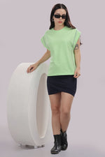Outlaws Sweet Green women's workout tank top featuring a sleeveless design and athletic fit for active wear.