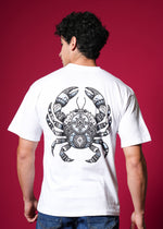 Outlaws White Oversized Cotton T-Shirt with streetwear style, featuring a relaxed fit and casual design, worn by a model.
