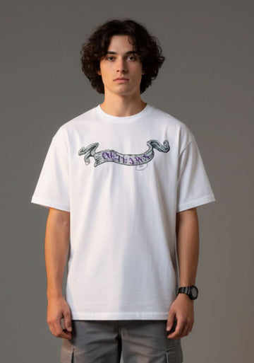 Outlaws White Oversized Cotton T-Shirt with streetwear style, featuring a relaxed fit and simple design, showcased on a hanger.