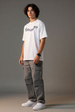 Outlaws White Oversized Cotton T-Shirt with streetwear style, featuring a relaxed fit and casual design for everyday wear.