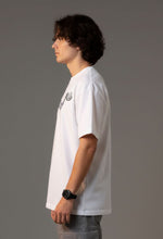 Outlaws White Oversized T-Shirt made of 100% cotton, featuring a relaxed streetwear style with bold Outlaws Fashion branding.