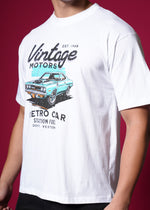 Outlaws White Oversized Cotton T-Shirt with streetwear style, displayed on a hanger showing front view.