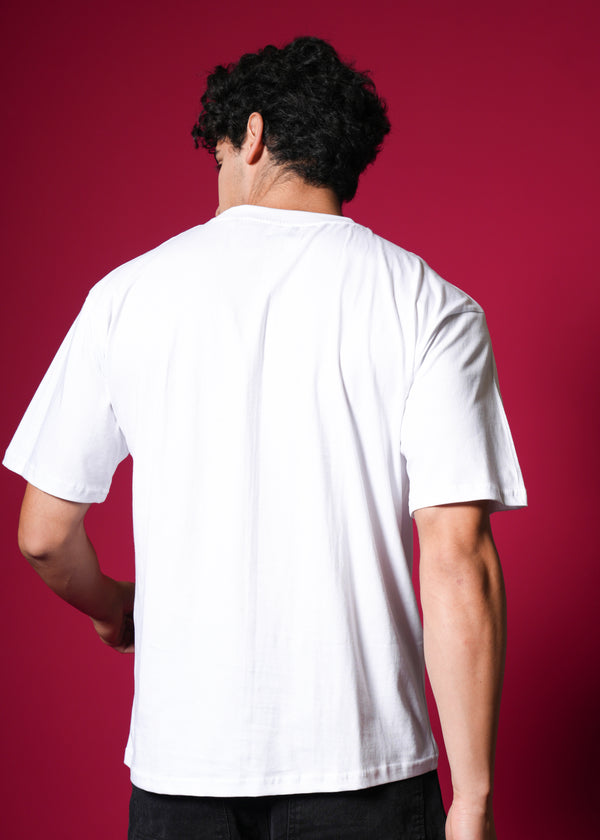 Outlaws White Oversized Cotton T-Shirt with streetwear style, soft fabric, and relaxed fit, displayed on a hanger.